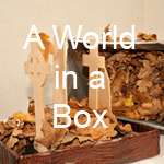 World in a Box button
